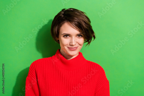 Photo of optimistic nice brunette hairdo lady wear red sweater isolated on bright green color background