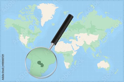 Map of the world with a magnifying glass on a map of Paraguay.