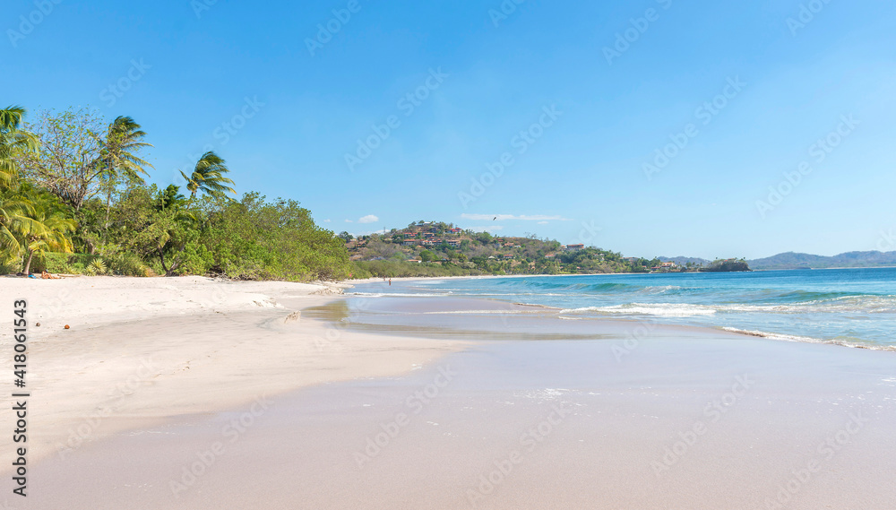 White Beach at Playa Flamingo with blue ocean. Guanacaste, Costa Rica, Central America..