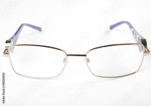 Eyeglasses with metal rim on white background