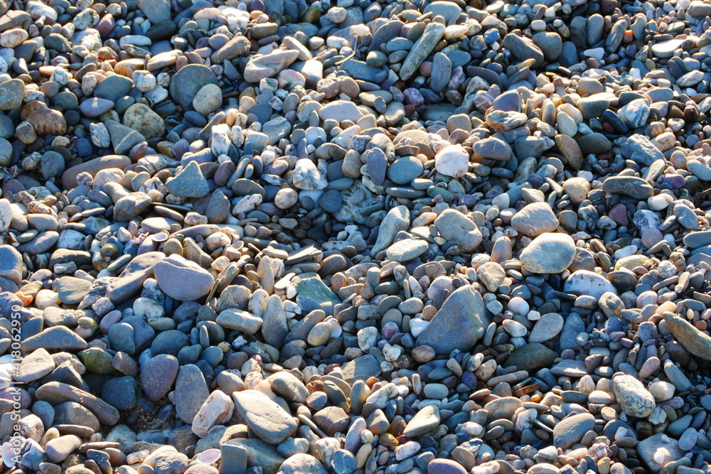 stone floor with rounded stones and footprints stone floor with rounded stones and footprints