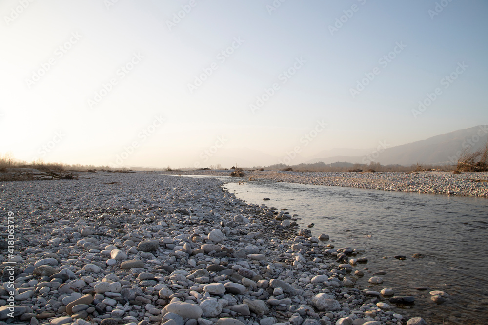 Calm river landscape with transparent water in a sunny day