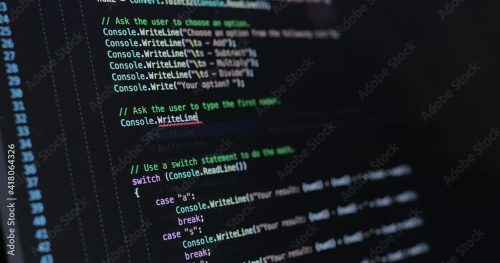 Text on laptop screen. The programmer writes the code.coding program programming developer compute web development work design software closeup desk write workstation key password theft hacking.