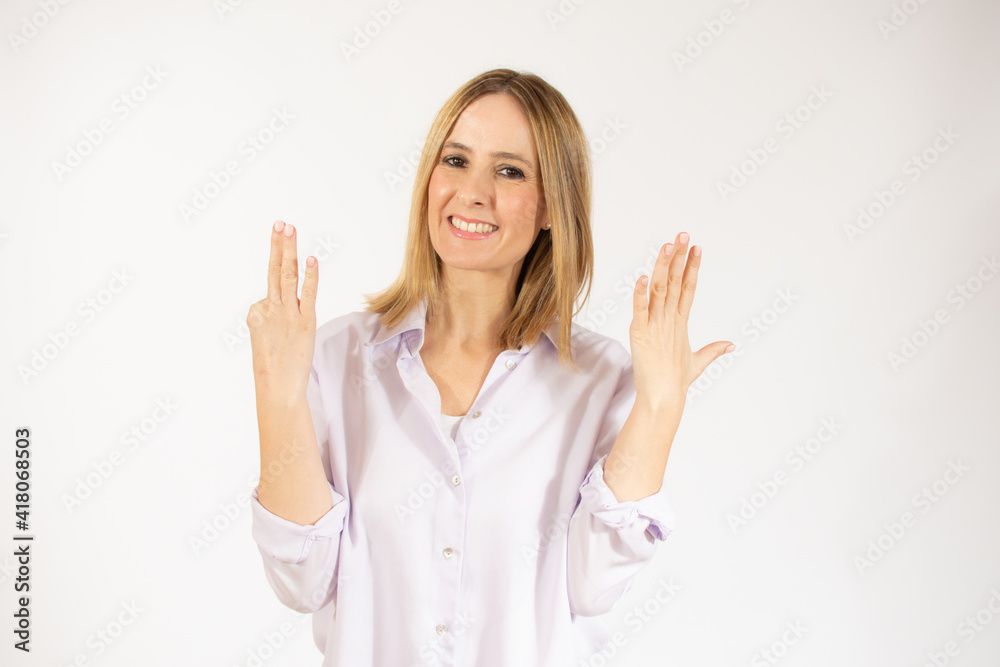 Young woman over isolated white background counting eight with fingers Young woman over isolated white background counting eight with fingers