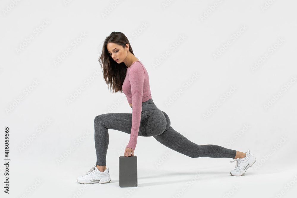 Fitness woman doing lunges exercises for leg muscle workout training Fitness woman doing lunges exercises for leg muscle workout training
