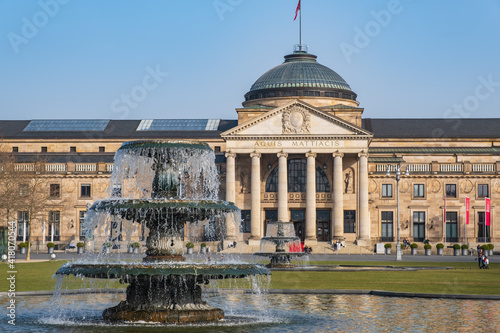 View towards the casino in Wiesbaden / Germany with the fountain in front of it 