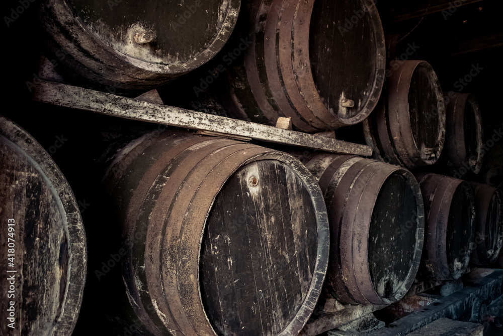 Monochrome perspective of old, retro and vintage barrels
