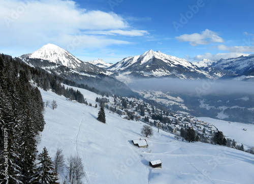 Aerial view of snowy alpine landscape in Leysin, Switzerland