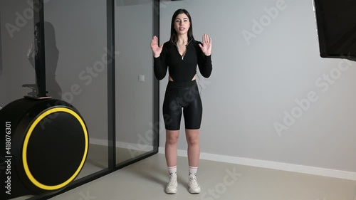 beautiful brunette girl fitness trainer