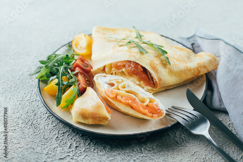 фотографія Crepes with stuffed cream cheese and salmon