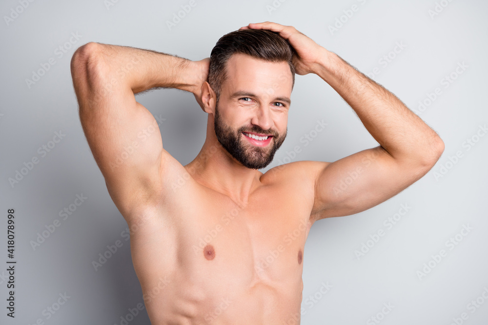 Photo of young handsome man happy positive smile enjoy haircare new shampoo isolated over grey color background Photo of young handsome man happy positive smile enjoy haircare new shampoo isolated over grey color background