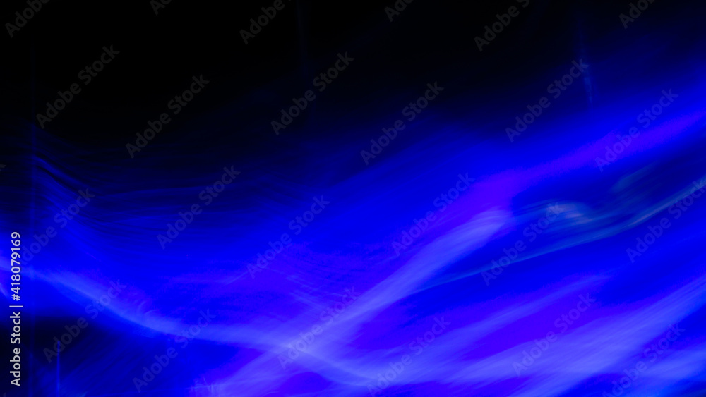 3D rendered or 3D illustration. Abstract shapes of blue and yellow colors on black background. Abstract art made with light painting. 3D rendered or 3D illustration. Abstract shapes of blue and yellow colors on black background. Abstract art made with light painting.