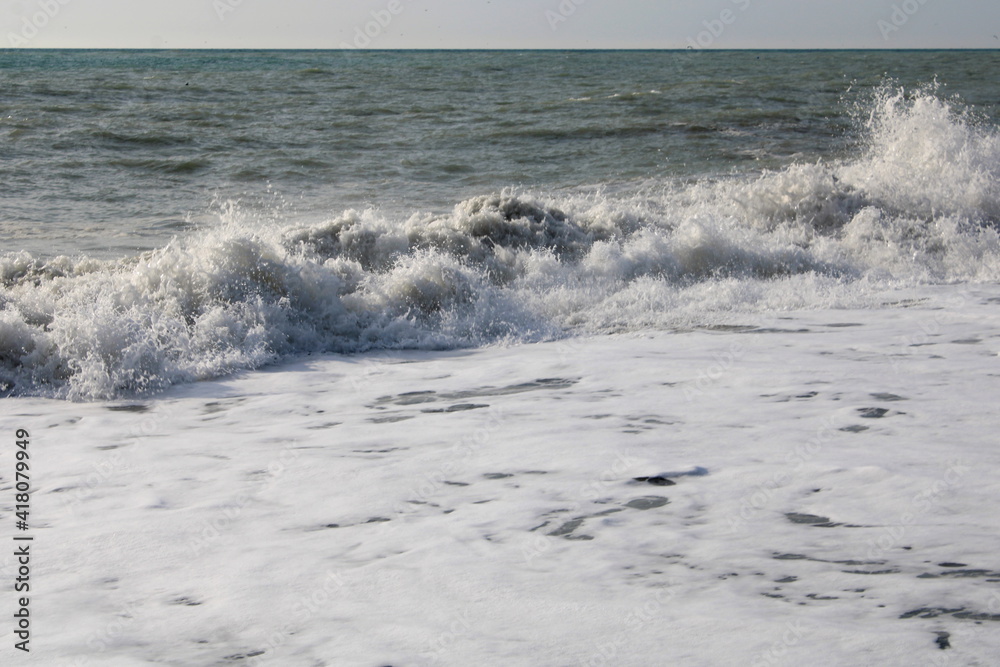 Sea surf on the Black Sea coast of the Caucasus in December.
