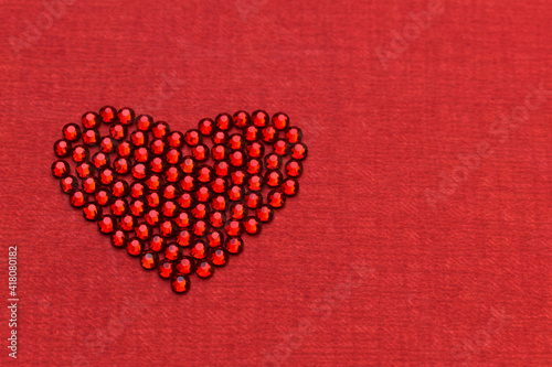 red heart on a red background