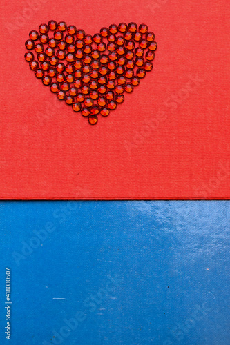 red heart on a red and blue background