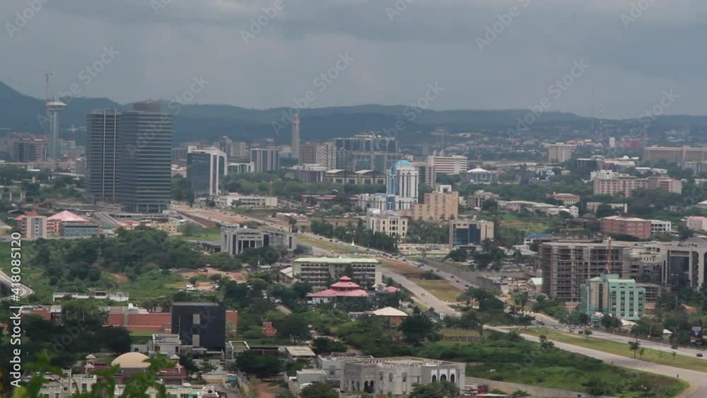 Business district in Abuja, Nigeria, static medium shot Business district in Abuja, Nigeria, static medium shot