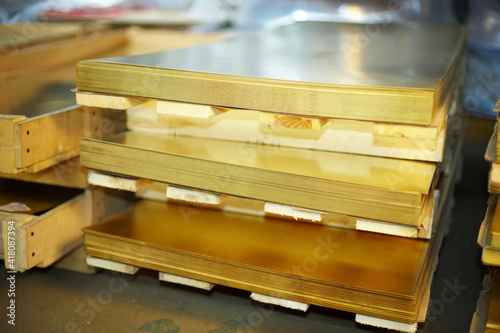 Many brass sheets, warehouse brass plates. photo