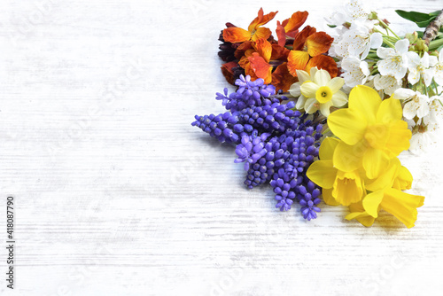 pretty little bouquet of fresh flowers picked in the garden on white table