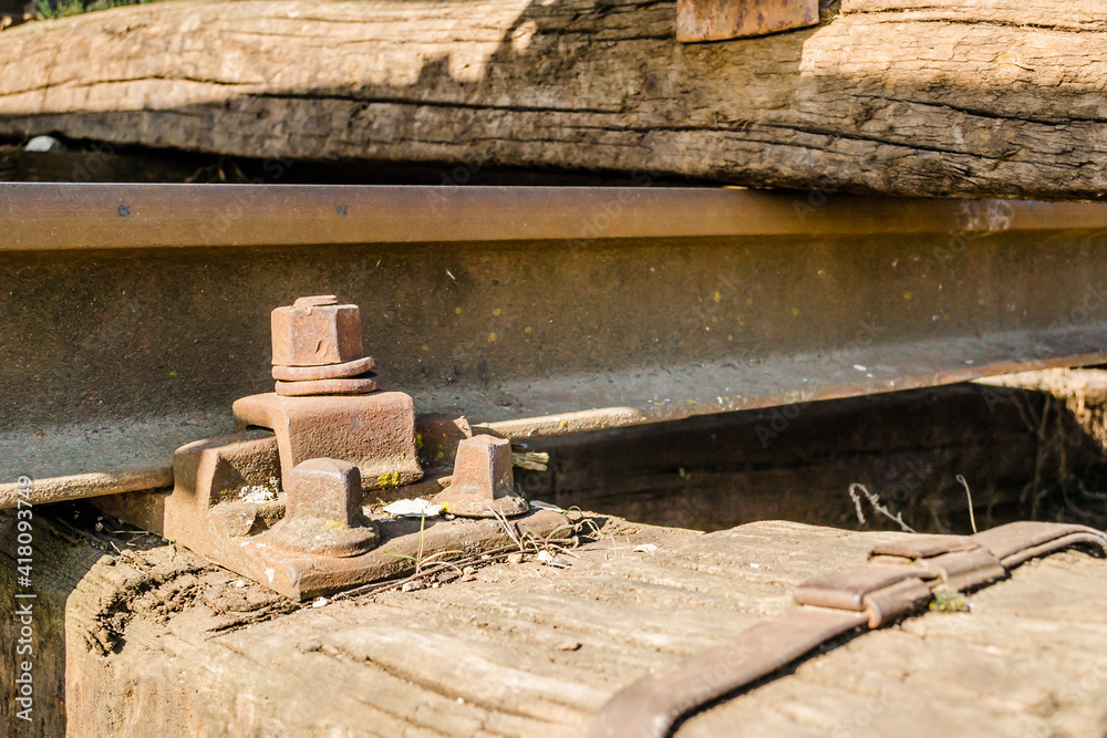 Old screws on slippers, railway sleepers, railway sleepers in the railway station Petrovaradin, Novi Sad, Serbia 