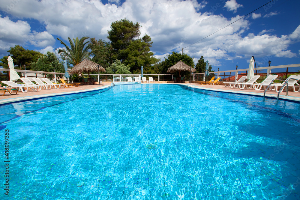 Swimming pool at holiday villa in Greece.