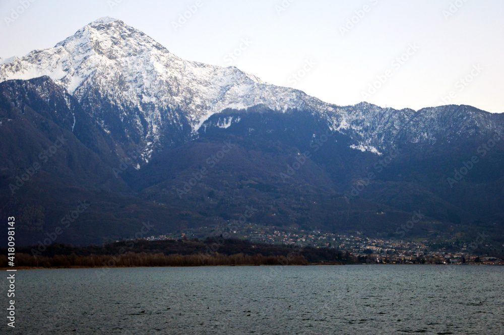 Mountain peak towering on Lake Como