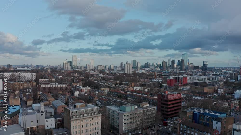 Slider drone shot of London skyscrapers from Camden