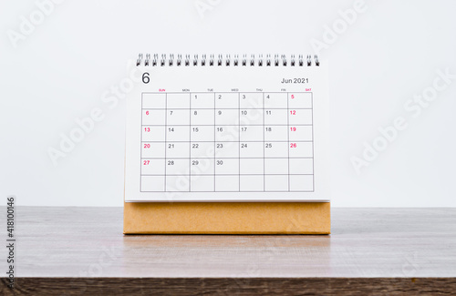 June Calendar 2021 on wooden table. photo