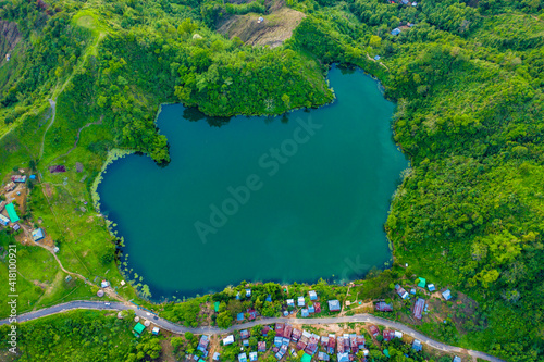 Aerial view of a few cottage along Boga lake in Ruma, Chittagong province, Bangladesh.