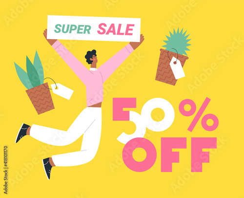A curly-haired young man holds a super discount poster