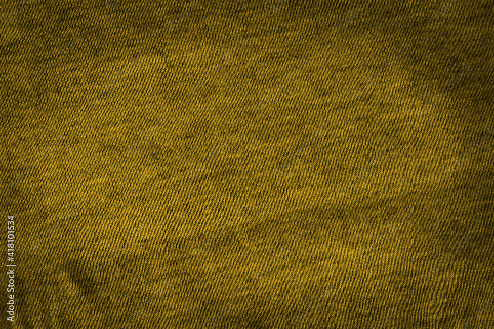 Texture of dark yellow or brown Italian cotton fabric.