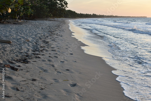 Footprints in a beautiful beach in Rinc  n del Mar  Colombia