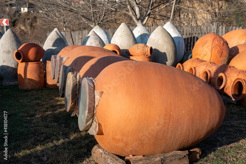 Georgian traditional jugs kvevri for wine, outdoor trade photo