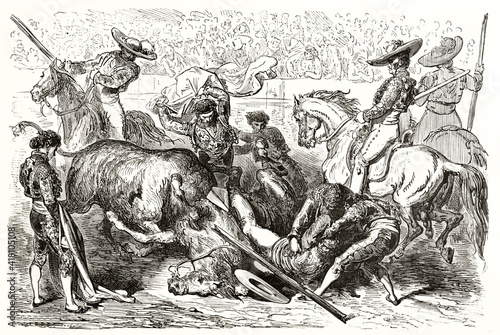 bullfighting violent scene. unseated picador falling down with horse attacked by angry bull. Ancient grey tone etching style art by Dore, Magasin Pittoresque, 1838