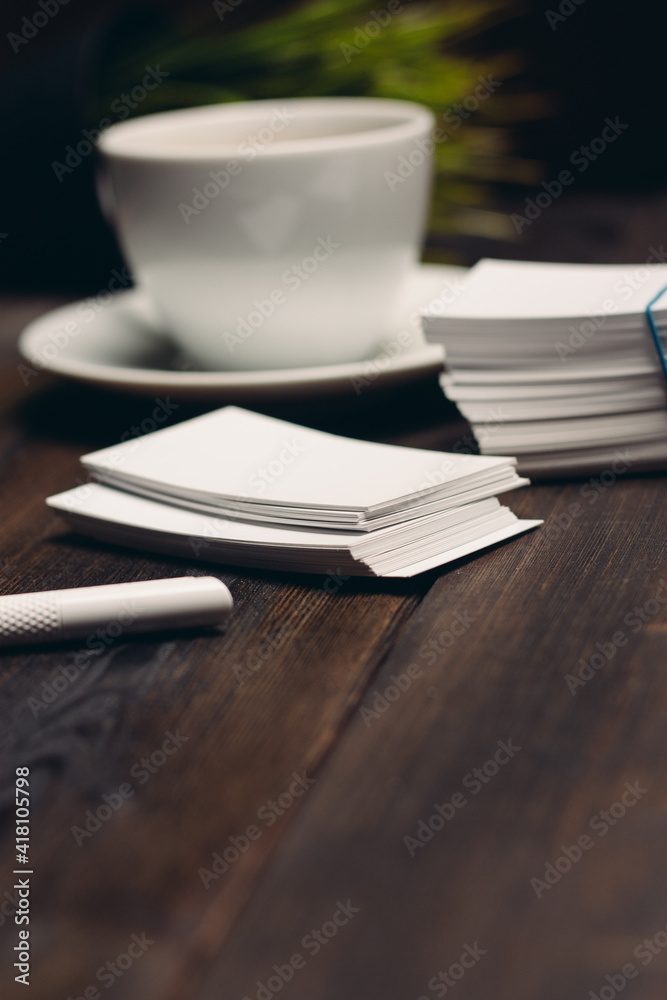 coffee cup on the table business cards office desktop business documents coffee cup on the table business cards office desktop business documents