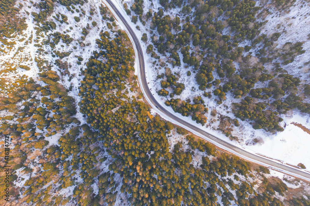 Aerial view on mountain road from drone in