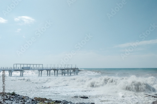 Waves crash on the shore. Storm into the rocky beach. Landscape of Batumi, Georgia