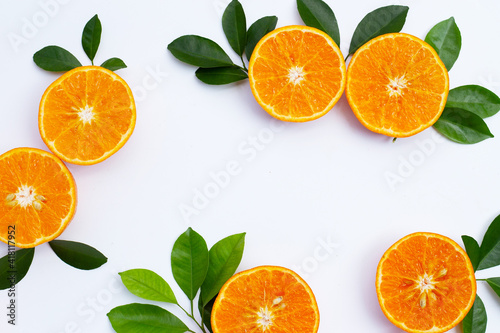 Frame made of orange fruits on white background. Citrus fruits low in calories, high in vitamin C and fiber