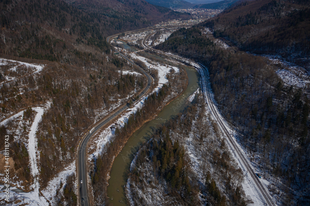 Aerial view on mountain road from drone in