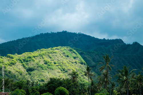 Bali tropical green hills and rain clouds