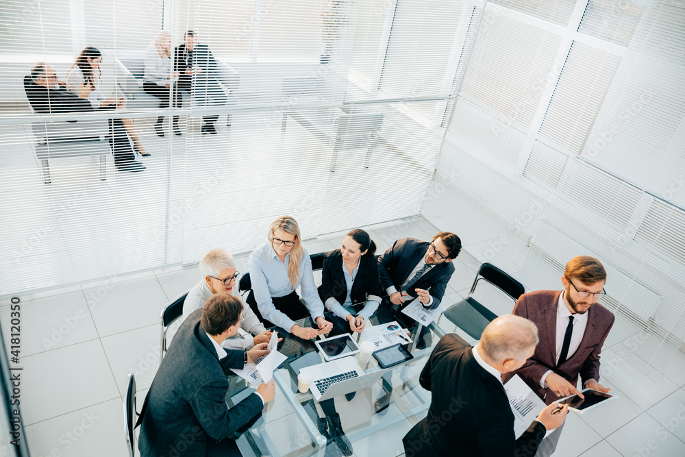 business team works with financial documentation in the office.