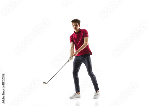 Quite composed. Golf player in a red shirt isolated on white studio background with copyspace. Professional player practicing with emotions and facial expression. Sport, motion, action concept.