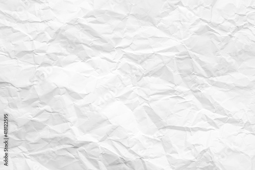 Clean white paper, wrinkled, abstract background.