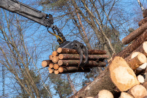 unloading logs after forestry work