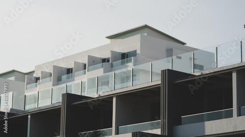 Newly built condominiums. Stylish exterior apartment photographed in a minimalist style.