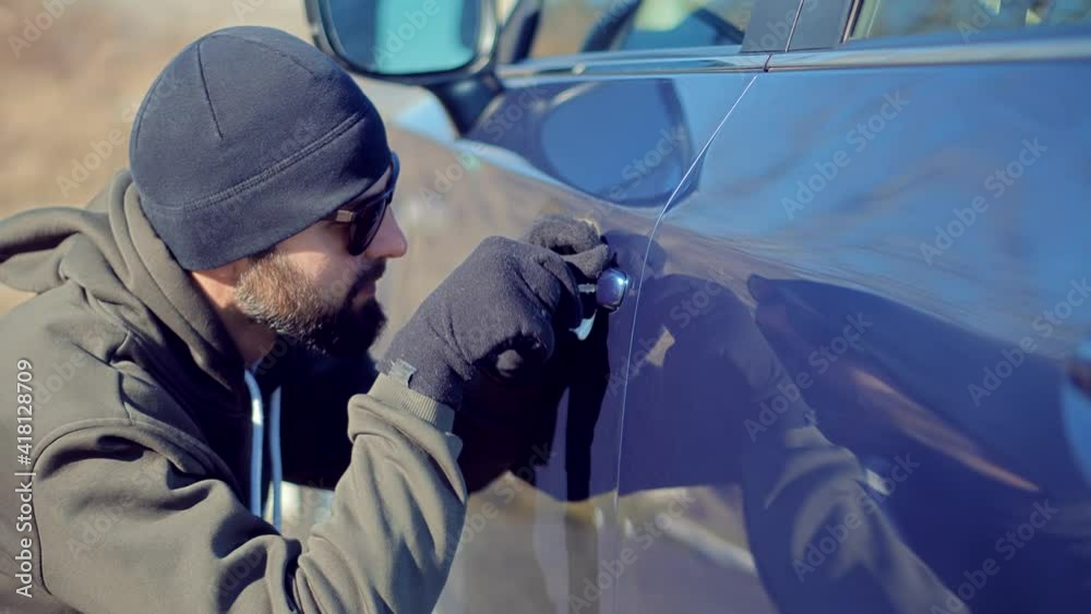 Vandalism Crime Theft Using Tool For Open Door.Thief Breaks Lock On Vehicle. Car Jacking Thief Steal Car Breaking Door. Criminal Bandit Job Burglar Hijacks Auto.Street Crime Violence Gangster Robber. Vandalism Crime Theft Using Tool For Open Door.Thief Breaks Lock On Vehicle. Car Jacking Thief Steal Car Breaking Door. Criminal Bandit Job Burglar Hijacks Auto.Street Crime Violence Gangster Robber.