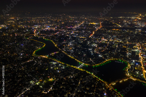 Aerial view of Dhaka cityscape and Gulshan lake at night, Dhaka, Bangladesh. photo