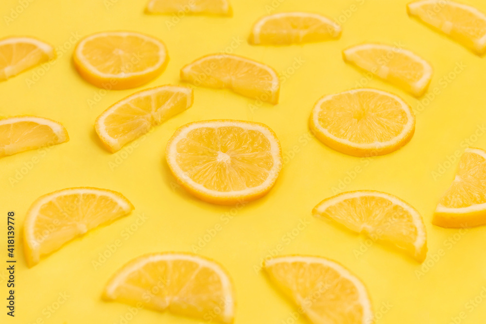 Fresh yellow lemon photographic pattern. Lemon wallpaper. Isolated on yellow background. Fresh yellow lemon photographic pattern. Lemon wallpaper. Isolated on yellow background.