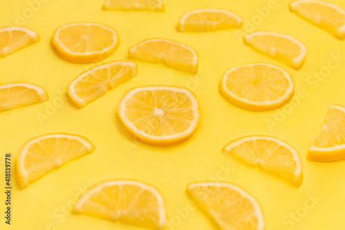 Fresh yellow lemon photographic pattern. Lemon wallpaper. Isolated on yellow background. 