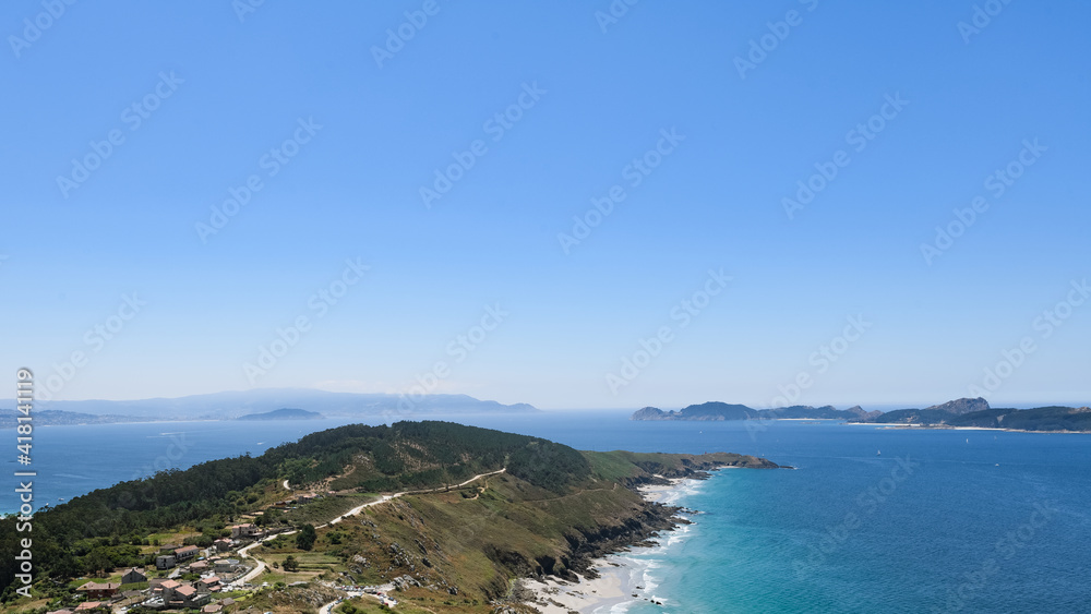 silhouette of the sea coast where a river enters in Galicia in Spain