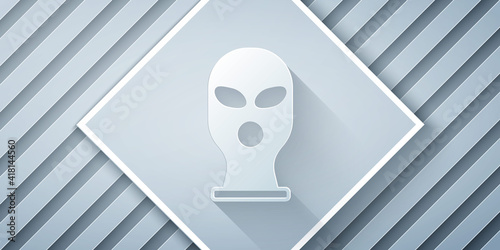 Paper cut Balaclava icon isolated on grey background. A piece of clothing for winter sports or a mask for a criminal or a thief. Paper art style. Vector.